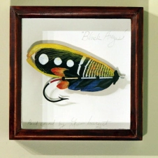 A salmon fly - carved in wood A salmon fly - carved in wood