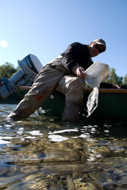 Emptying the canoe Emptying the canoe